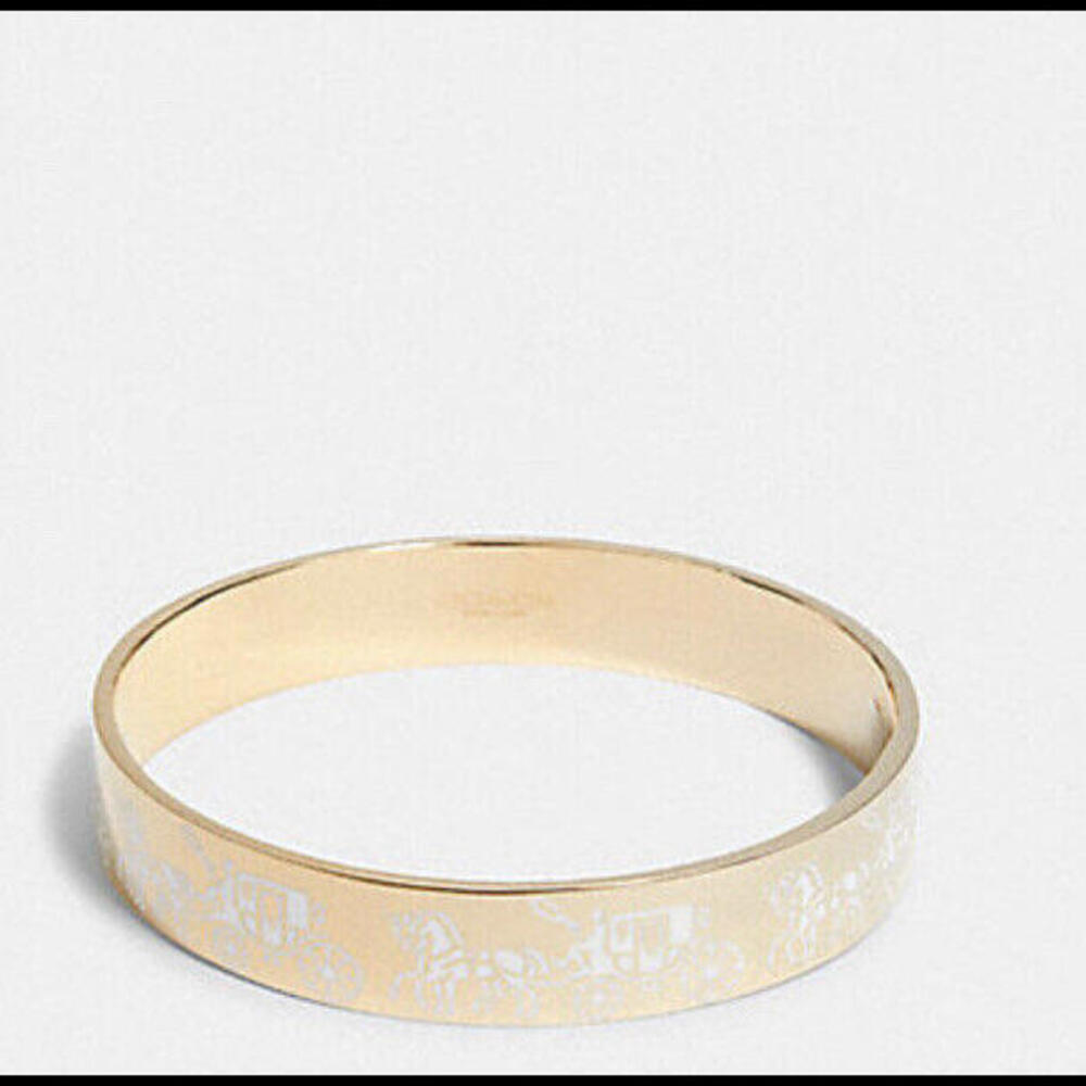 Coach 1790 Horse and Carriage Bangle Bracelet  in Gold/White New with Tags